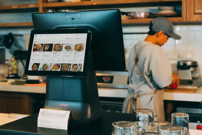 A food-court stall billing on its own terminal